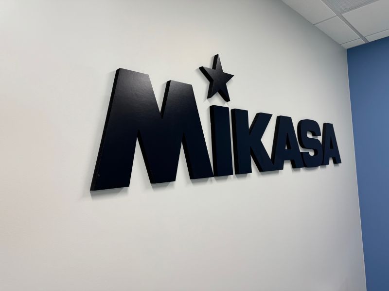 Black 3D foam letters and star wall sign in an office in Corona, CA.